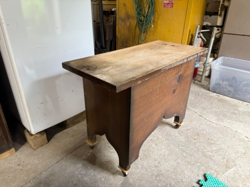 Salvaged bench with casters added.